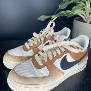 Nike White and Tan Sneakers with Black Swoosh